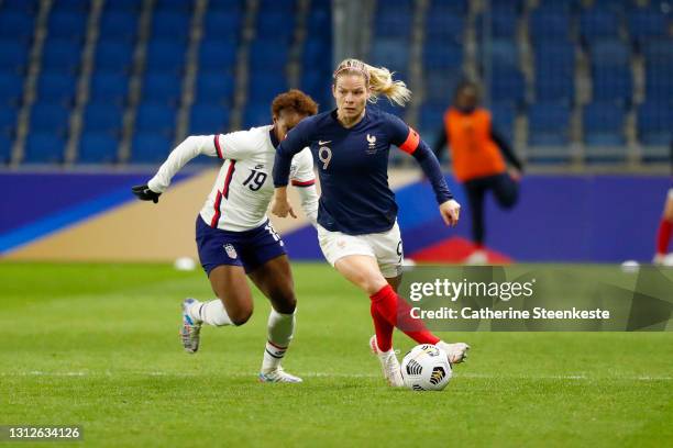 Eugenie Le Sommer of France controls the ball against Crystal Dunn of USA during the International women friendly match between France and United...