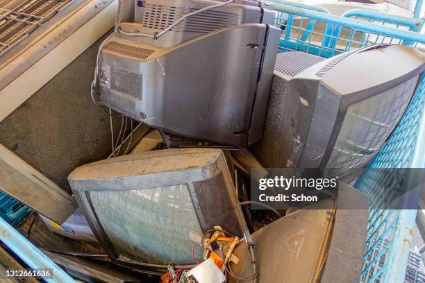 collection broken tvs at a recycling station - nuclear waste management stock pictures, royalty-free photos & images