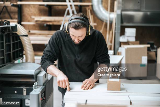 carpenter master checking quality of furniture panels - customised stock pictures, royalty-free photos & images