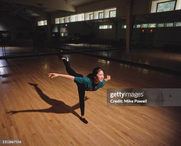 Michelle Kwan of the United States practices her figure skating program routine on 23rd September 1994 at the Ice Castle International Training...