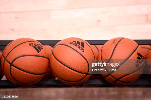 The Adidas logo on a basketball during the game between the George Washington Colonials and the Davidson Wildcats at Charles E. Smith Athletic Center...