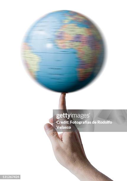 globe - world at your fingertips stockfoto's en -beelden