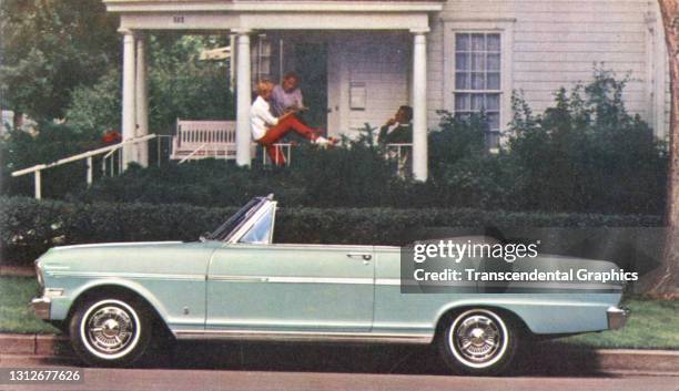 Postcard advertises the GM Chevrolet Nova Sport Coupe parked outside a house with a porch, 1963.