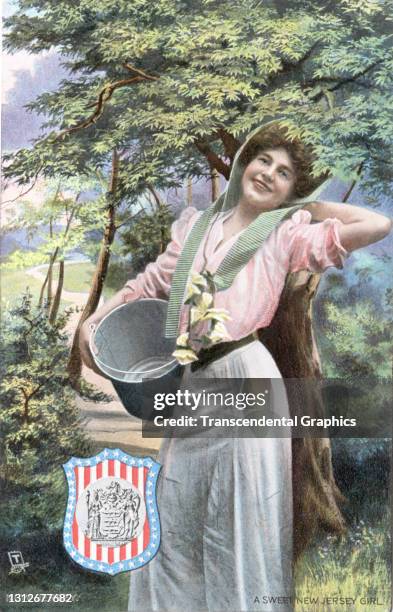 Postcard features an illustration of a young woman as she poses with a milk pail, circa 1910. The postcard is part of series in which each American...