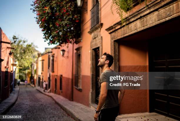 man exploring city streets at mexico - guanajuato city stock pictures, royalty-free photos & images
