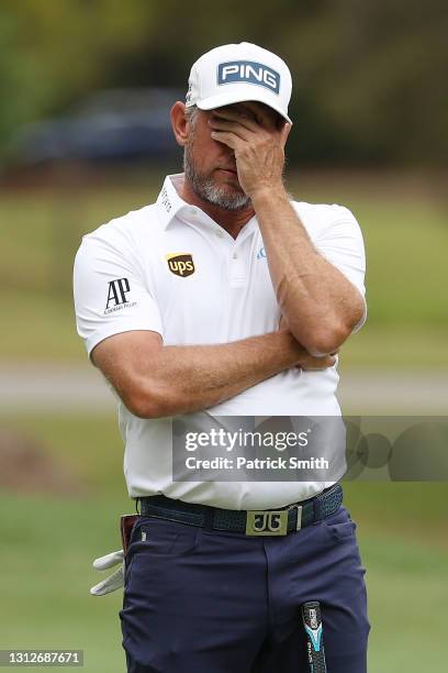 Lee Westwood of England reacts to missing a putt on the 14th green during the first round of the RBC Heritage on April 15, 2021 at Harbour Town Golf...