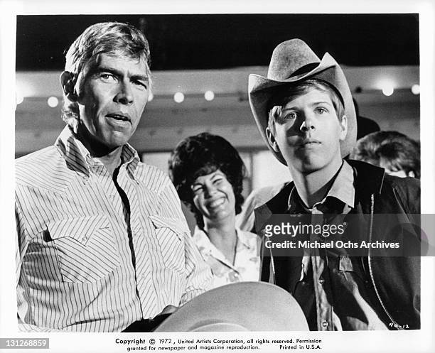 James Coburn and Ted Eccles both looking straight ahead in a scene from the film 'The Honkers', 1972.