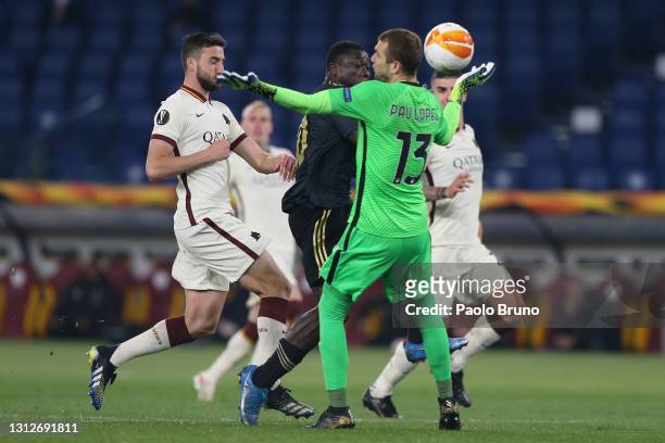 Brian Brobbey of Ajax scores their team's first goal past Pau Lopez of Roma during the UEFA Europa League Quarter Final Second Leg match between AS...