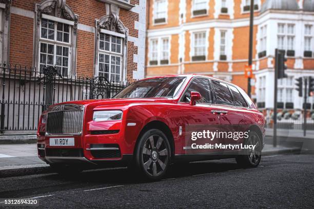 The Rolls Royce Cullinan in Mayfair, London. The Cullinan is Rolls Royces first attempt at an SUV, and is also the brands first all wheel drive...