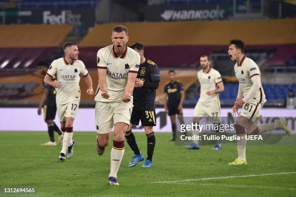 Edin Dzeko of Roma celebrates after scoring their team's first goal during the UEFA Europa League Quarter Final Second Leg match between AS Roma and...