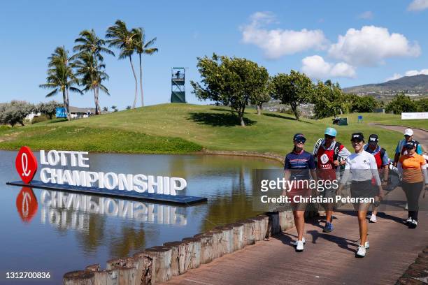 Lydia Ko of New Zealand, Cheyenne Knight of the United States and Moriya Jutanugarn of Thailand walk up to the 16th green during the second round of...