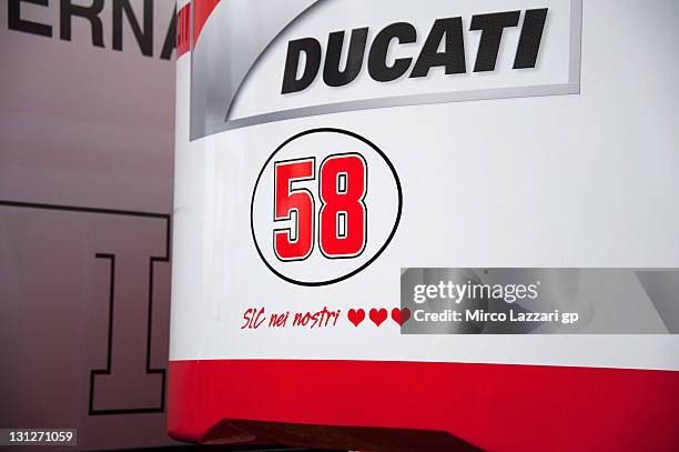 The Ducati Marlboro Team remember and give a tribute at Marco Simoncelli of Italy and San Carlo Honda Gresini during the MotoGP of Valencia at...