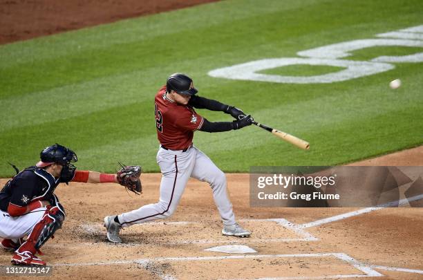 Andrew Young of the Arizona Diamondbacks hits a grand slam in the second inning against the Washington Nationals at Nationals Park on April 15, 2021...