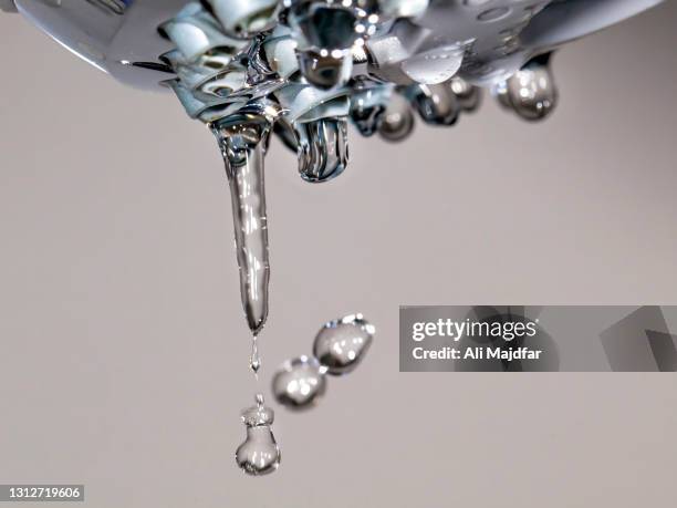 water drops - slow motion water stock pictures, royalty-free photos & images