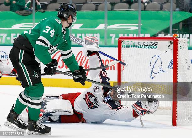 Denis Gurianov of the Dallas Stars scores a goal against Elvis Merzlikins of the Columbus Blue Jackets in the second period at American Airlines...