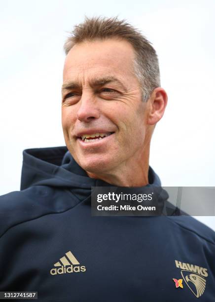 Alastair Clarkson, senior coach of the Hawks talks to the media during a Hawthorn Hawks AFL training session at Waverley Park on April 16, 2021 in...