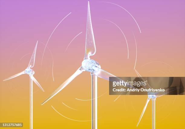 Wind turbines on sunset sky