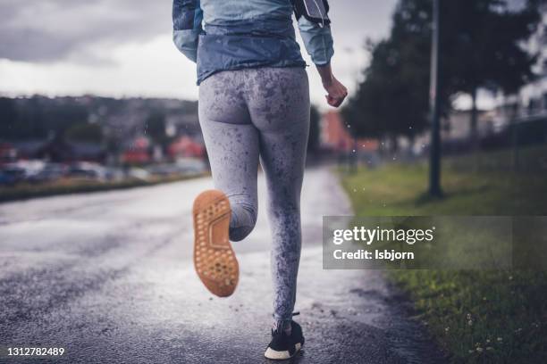 Woman Getting Rained On While Running Running Woman Rain Photos and Premium High Res Pictures - Getty Images
