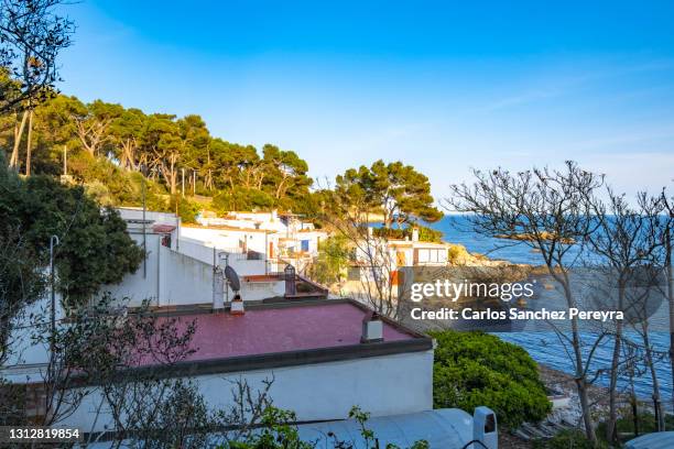 beach in costa brava - fishing hut stock pictures, royalty-free photos & images