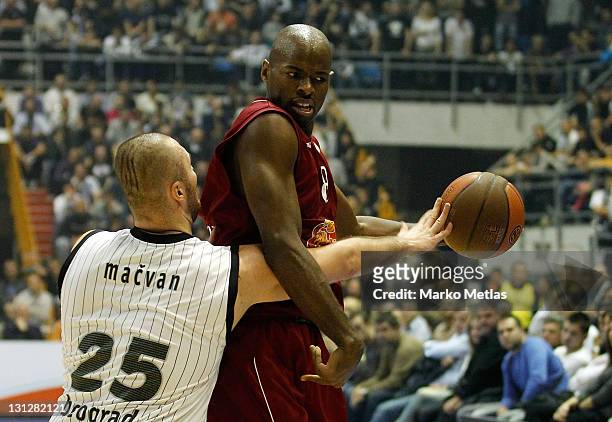 Caleb Green, #8 of Belgacom Spirou Basket competes with Milan Macvan of Partizan MTS Belgrade during the 2011-2012 Turkish Airlines Euroleague...