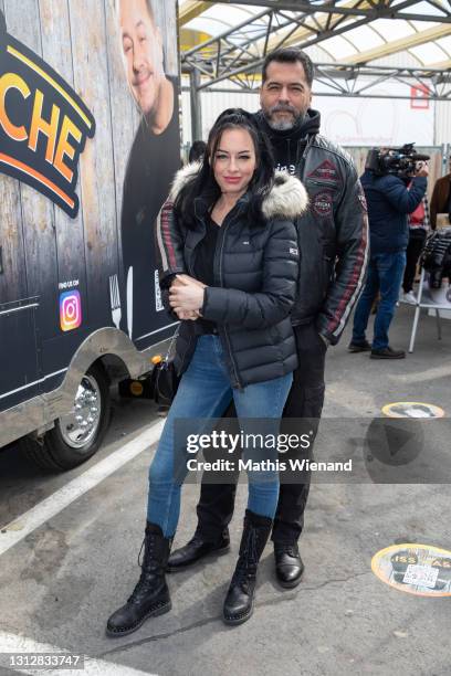 Aurelio Savina and his girlfriend Larissa attend the opening of "Willi Herren's Rievkooche Bud" on April 16, 2021 in Cologne, Germany.