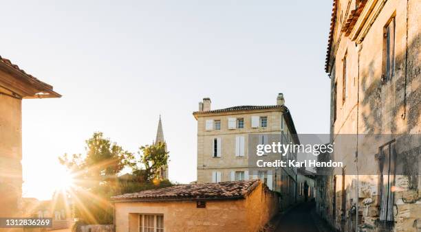 a view of the village of st.emilion in france at sunset - stock photo - bordeaux wine - fotografias e filmes do acervo