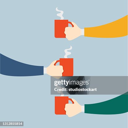 Hand Holding a Coffee Cup Hand Holding a Coffee Cup