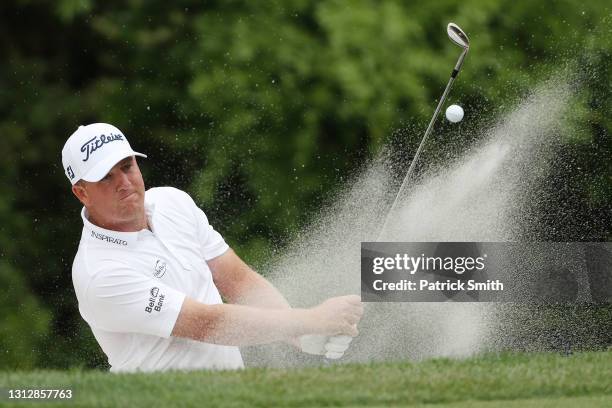 Tom Hoge of the United States plays a shot from a bunker on the eighth hole during the second round of the RBC Heritage on April 16, 2021 at Harbour...