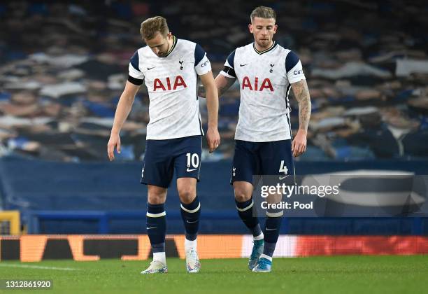 Harry Kane of Tottenham Hotspur is consoled by teammate Toby Alderweireld as he leaves the field of play following an injury during the Premier...