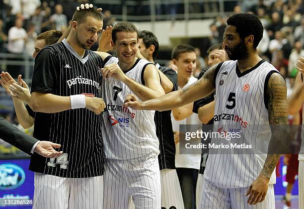 Rasko Katic of Partizan MTS Belgrade, Dusan Kecman of Partizan MTS Belgrade, Acie Law of Partizan MTS Belgrade celebrate during the 2011-2012 Turkish...