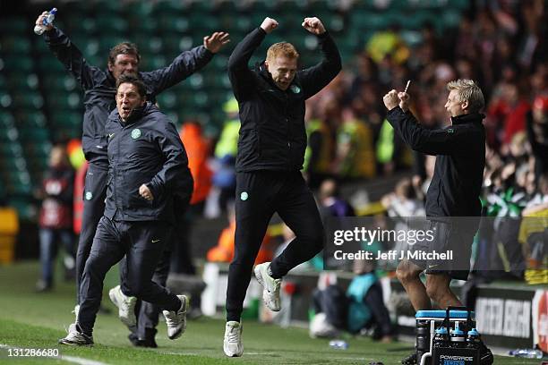 Neil Lennon coach of Celtic celebrates a goal by Gary Hooper during the UEFA Europa League Group I match between Celtic and Stade Rennais at Celtic...