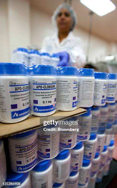 Bottles of Apo-Clonidine, an antihypertensive or vascular stabilizer, are packaged for distribution at the Apotex Inc. Plant in Toronto, Ontario,...