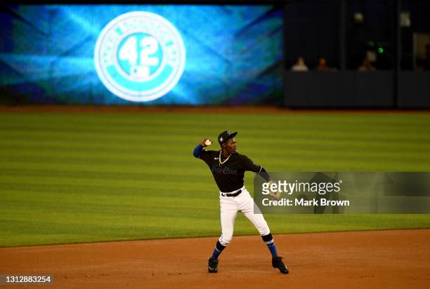 Jazz Chisholm Jr. #2 of the Miami Marlins makes a throw to first bases prior to the start of the first inning against the San Francisco Giants at...