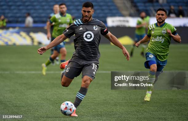 Michael Boxall of Minnesota United FC brings the ball up the pitch during the first half of the match against the Seattle Sounders FC at Lumen Field...