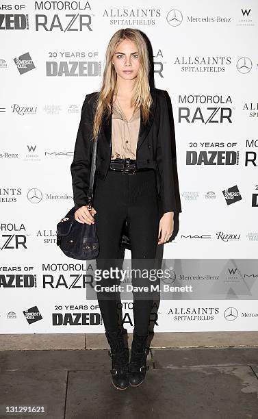 Cara Delevingne arrives at an exhibition celebrating the 20th anniversary of Dazed & Confused Magazine in partnership with Motorola, coinciding with...