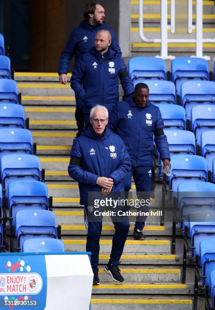Mick McCarthy manager of Cardiff City makes his way down the steps followed by assistant Terry Connor ahead of the Sky Bet Championship match between...