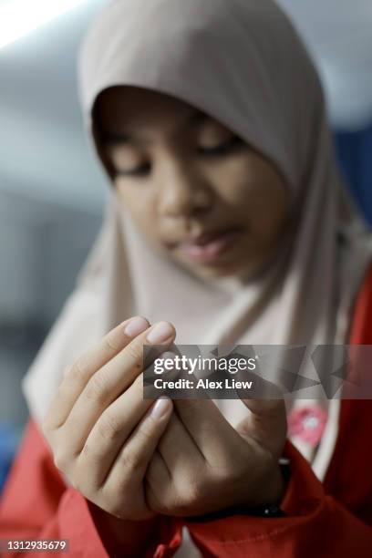 muslim prayers - namaz stock pictures, royalty-free photos & images