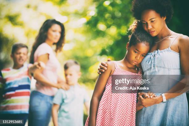 misunderstanding in the park. - sad mum stock pictures, royalty-free photos & images