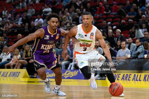 Scott Machado of Cairns Taipans and Casper Ware of Sydney Kings in action during the round 14 NBL match between the Sydney Kings and the Cairns...