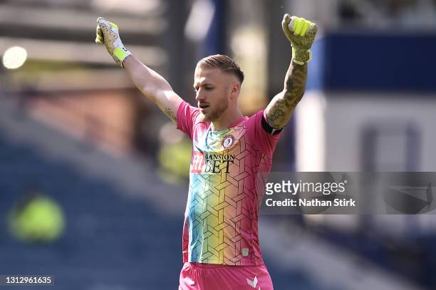 Daniel Bentley of Bristol City celebrates after his teammate Tyreeq Bakinson scored their side's first goal during the Sky Bet Championship match...