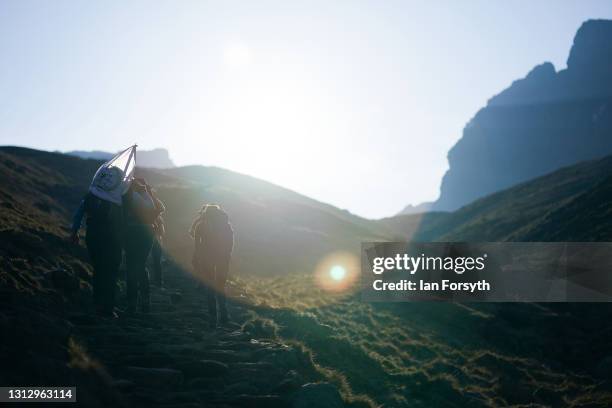 Outward Bound Trust members ascend to the summit of Scafell Pike in Cumbria to raise the Royal Sovereign flag in honour of HRH Duke of Edinburgh’s...