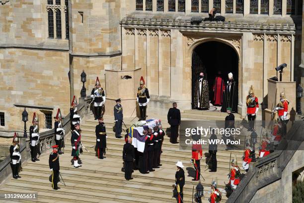The Duke of Edinburgh’s coffin, covered with His Royal Highness’s Personal Standard arrives at St George’s Chapel carried by a bearer party found by...