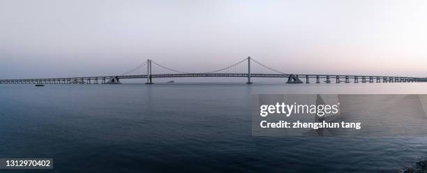 dalian xinghai bay bridge - dique barragem imagens e fotografias de stock