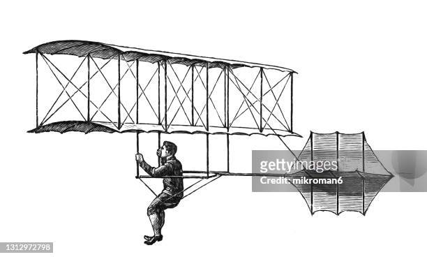 old engraved illustration of historic flying machine, biplane hang glider, constructed by octave chanute - contraptie stockfoto's en -beelden