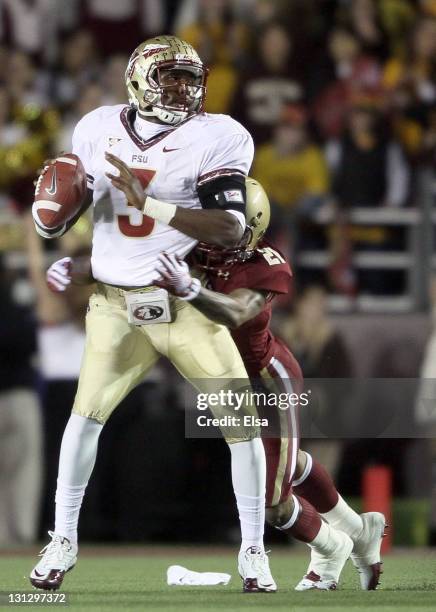 Manuel of the Florida State Seminoles is sacked by Manny Asprilla of the Boston College Eagles on November 3, 2011 at Alumni Stadium in Chestnut...