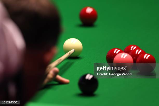 General view of the white ball as Jamie Jones plays a shot during the Betfred World Snooker Championship Round One match between Stephen Maguire and...