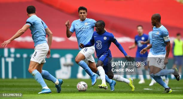 Golo Kante of Chelsea is challenged by Rodrigo of Manchester City during the Semi Final of the Emirates FA Cup match between Manchester City and...