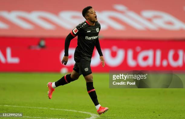 Leon Bailey of Bayer Leverkusen celebrates after scoring their team's third goal during the Bundesliga match between Bayer 04 Leverkusen and 1. FC...