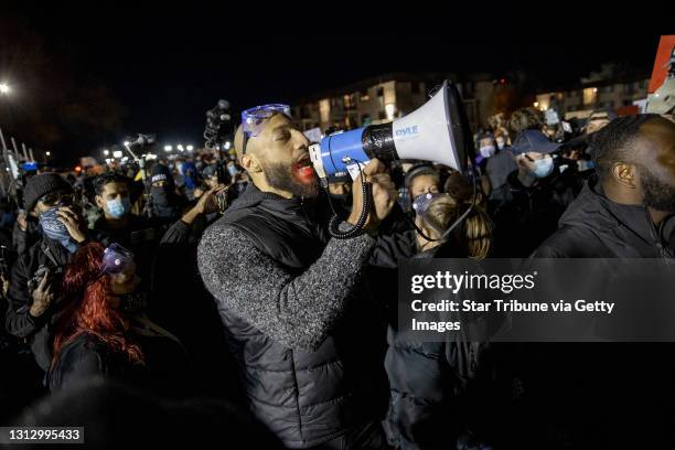 Royce White addresses the crowd. Protestors continued to gather in front of the Brooklyn Center Police Department after Sunday's fatal shooting of...