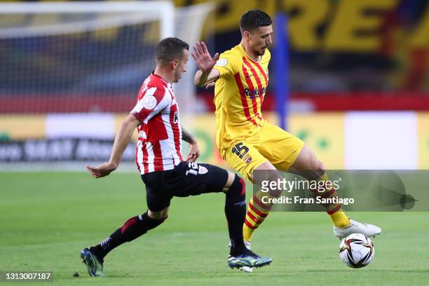 Clement Lenglet of Barcelona and Alejandro Berenguer Remiro of Athletic Club compete for the ball during the Copa del Rey Final match between...